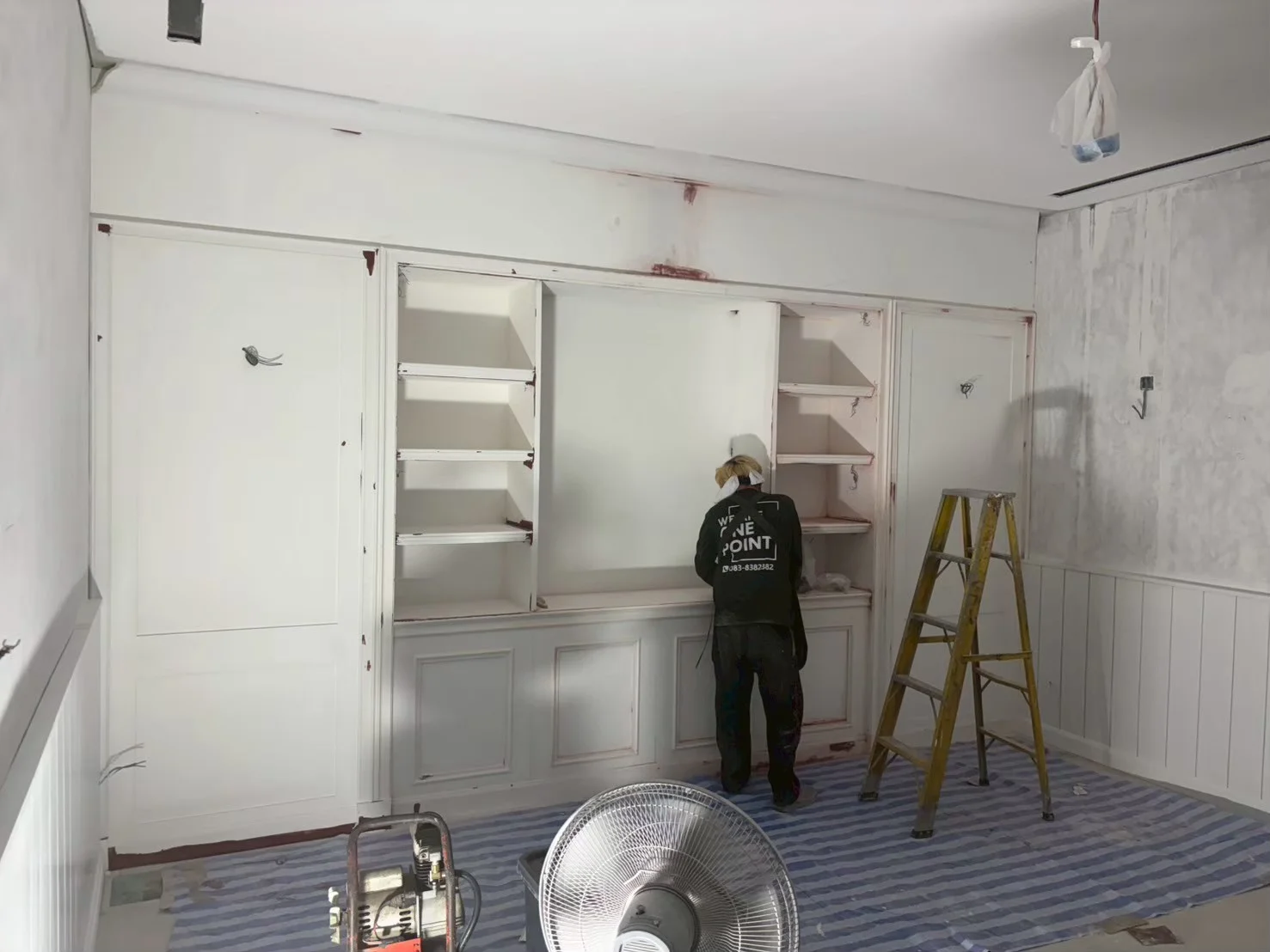 Carpenter was installing a furniture with a high standard in Hospital
