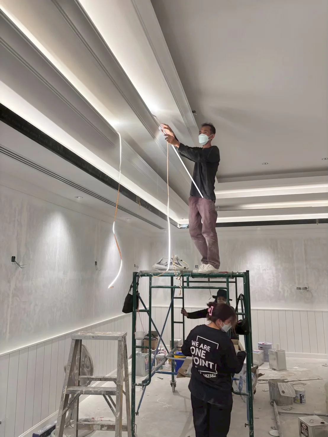 Electrician install a cave light in hospital